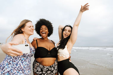 Happy women on a beach