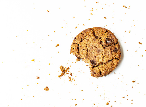 Cookies information a cookie surrounded by crumbs