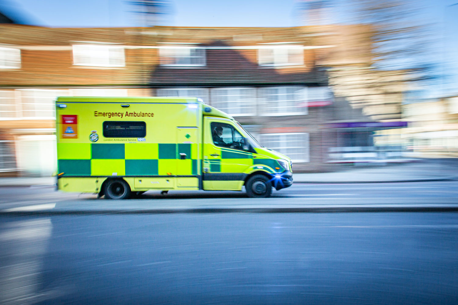 an ambulance travelling at speed