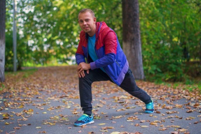 Man doing leg stretch