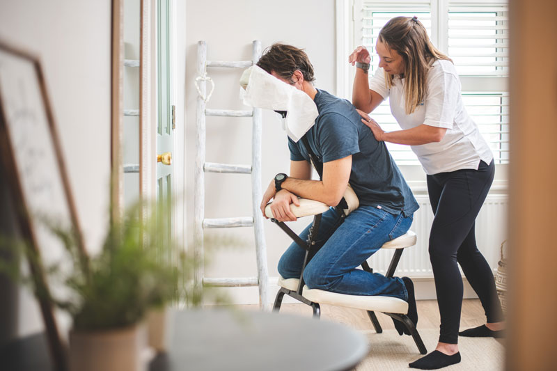 Sense therapist massaging a man