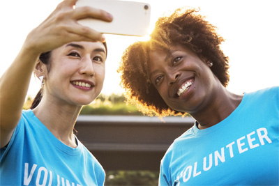 Two women volunteers taking a selfie